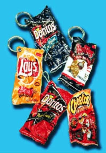 Everyone will have a blast making these 25 Shrinky Dink ideas that are easy to make. Find ideas from key chains and necklaces to magnets and much more! Chip bag Shrink Dinks with clips.