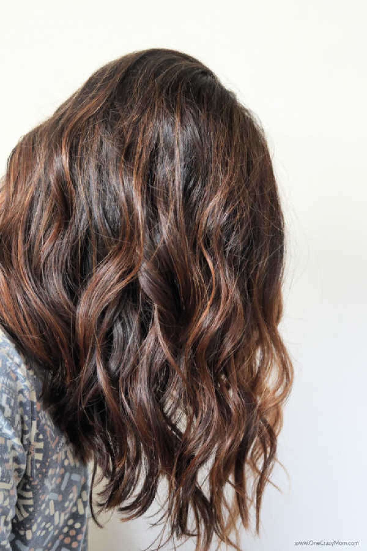 This super easy DIY Sea Salt Spray gives your hair amazing texture and waves in minutes. Make this homemade sea salt spray today! Hair with sea salt spray applied.