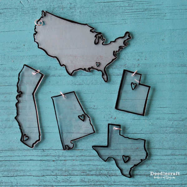 Everyone will have a blast making these 25 Shrinky Dink ideas that are easy to make. Find ideas from key chains and necklaces to magnets and much more! State jewelry made from shrinky dinks.