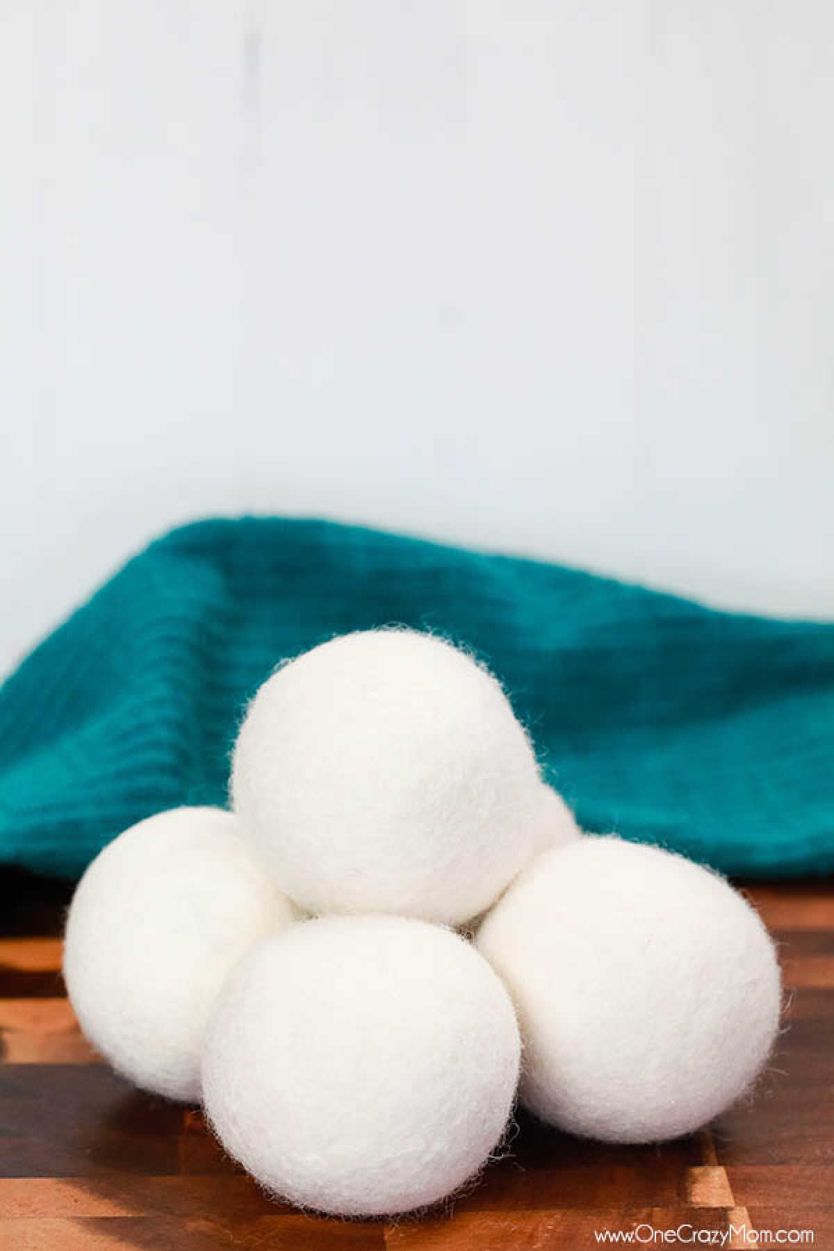 Learn how to use wool dryer balls instead of dryer sheets for a chemical free alternative to softer clothes. Wool dryer balls also help dry clothes quicker.
