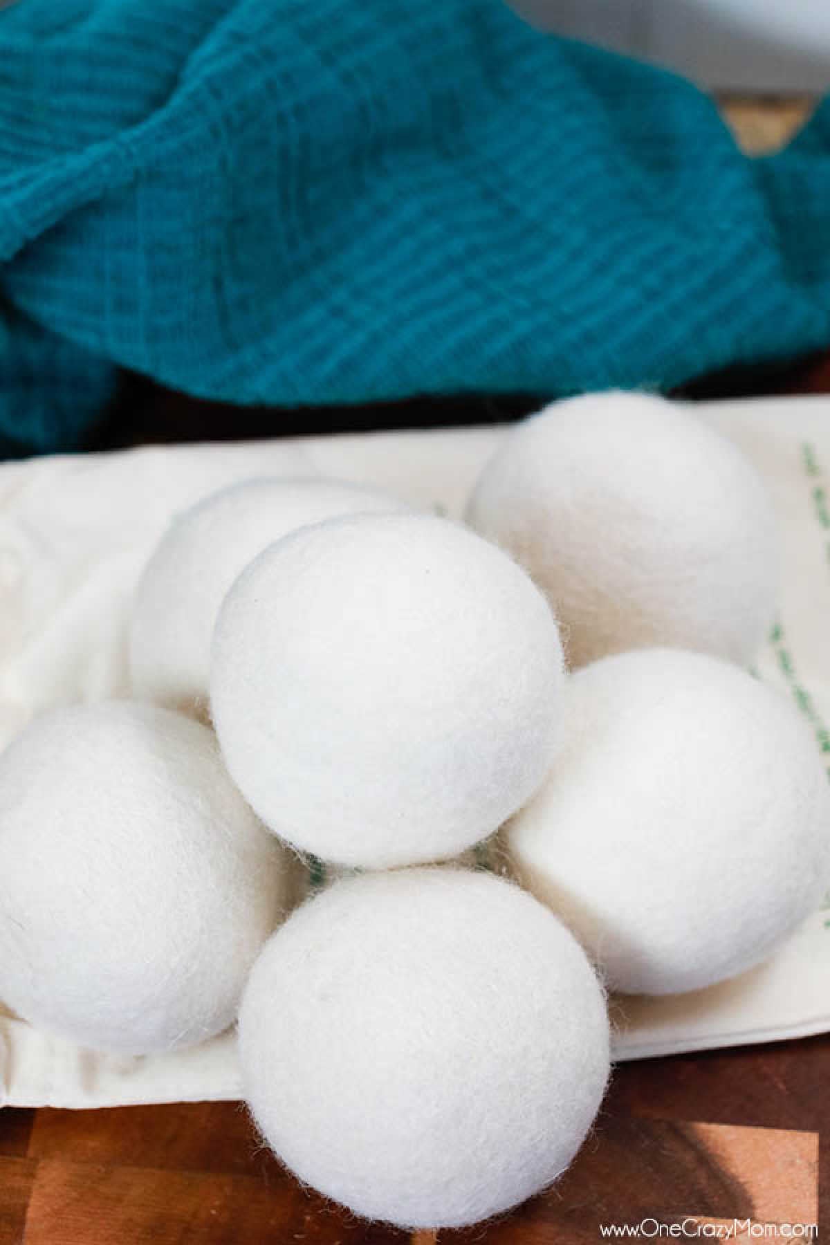Learn how to use wool dryer balls instead of dryer sheets for a chemical free alternative to softer clothes. Wool dryer balls also help dry clothes quicker.