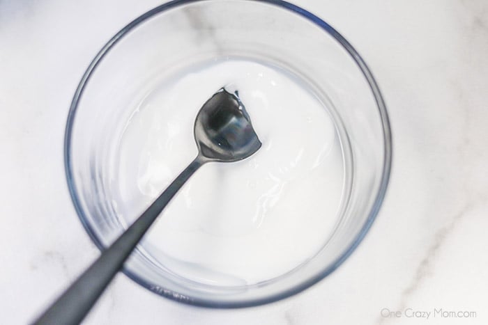 Learn how to make Birthday Cake Slime with only 3 ingredients. Adults and kids love making this birthday cake foam slime recipe in just minutes. It's easy to make this DIY slime recipe! #onecrazymom #slimerecipes #birthdaycakeslime Mixing bowl with liquid starch.
