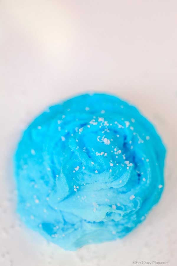 We have the best cloud slime recipe and it is super easy to make. If your kids love slime, they are going to love to learn how to make cloud slime. Blue cloud slime in a ball.