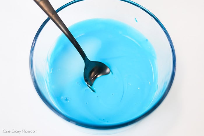We have the best cloud slime recipe and it is super easy to make. If your kids love slime, they are going to love to learn how to make cloud slime. Glue and food color mixed together.