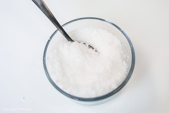 We have the best cloud slime recipe and it is super easy to make. If your kids love slime, they are going to love to learn how to make cloud slime. Bowl with instant snow.