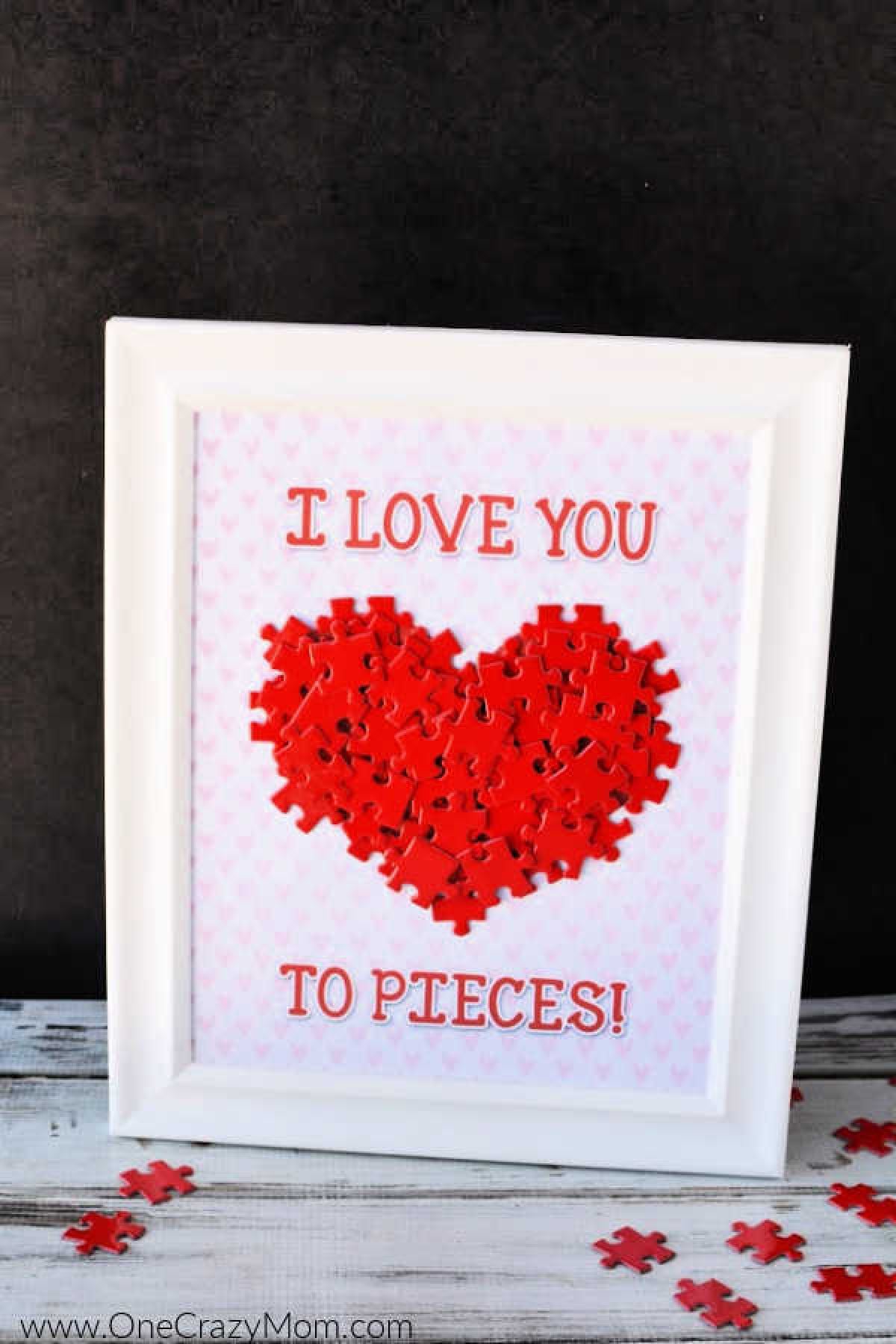 Valentine's Day is around the corner and you are going to have a blast making this I love you to pieces craft. Get your free i love you to pieces template. Love you to pieces framed and ready to display.