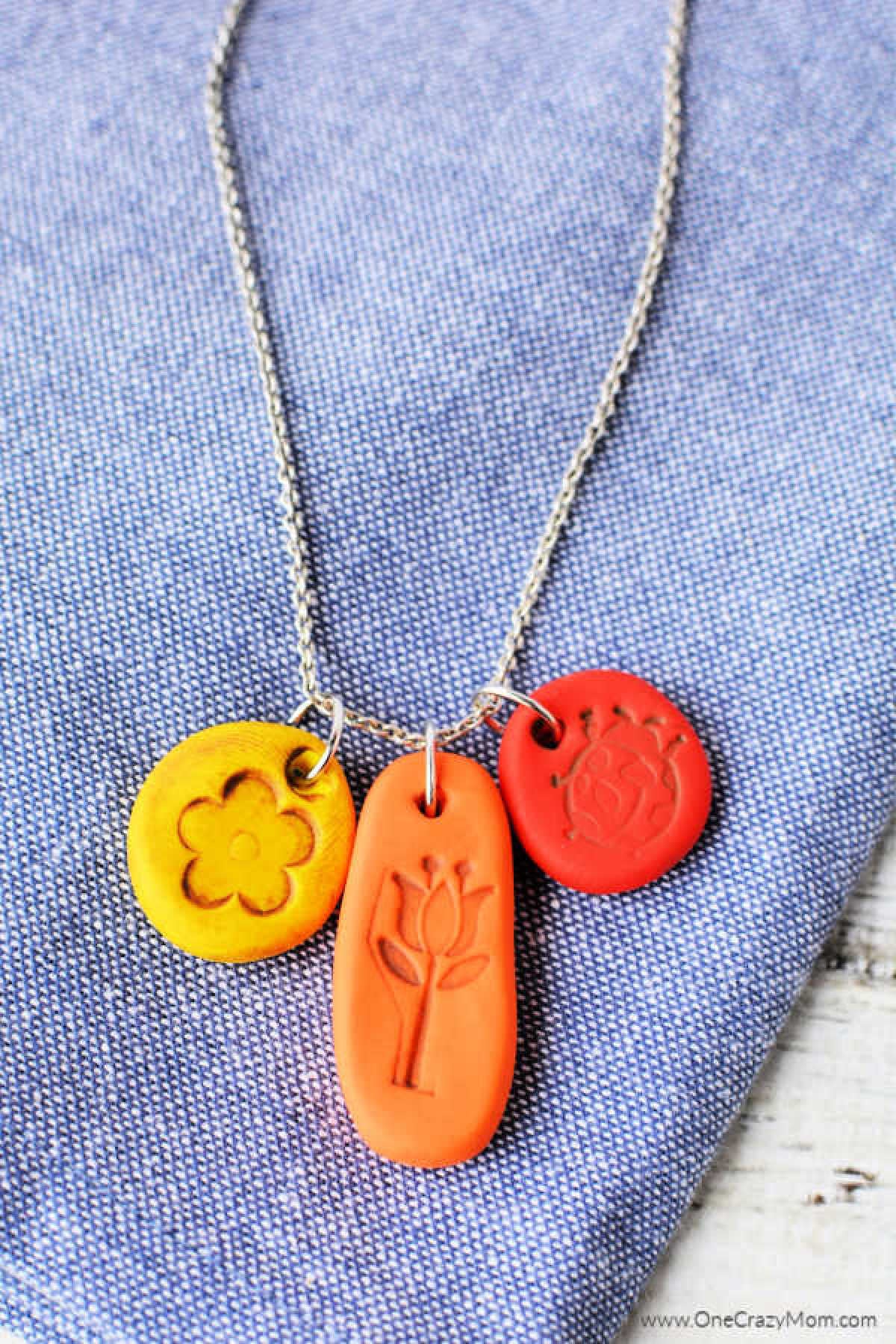 We have even more fun and easy Polymer Clay Jewelry ideas to try. Learn how to make a polymer clay necklace that is so fun and really pretty. Clay charms on a necklace.