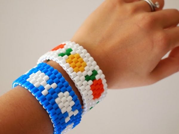 Perler bead crafts are so much fun and we have over 15 easy perler bead ideas. Choose from picture frames, magnets and so much more. Stretchy bracelet on arm.