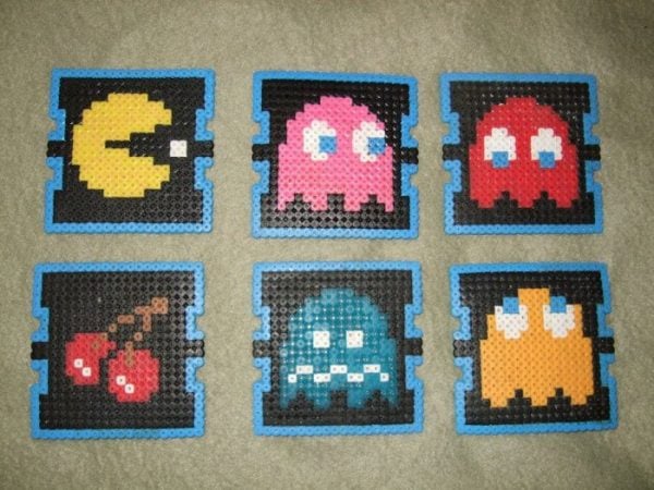 Perler bead crafts are so much fun and we have over 15 easy perler bead ideas. Choose from picture frames, magnets and so much more. Pac Man Coasters grouped together.