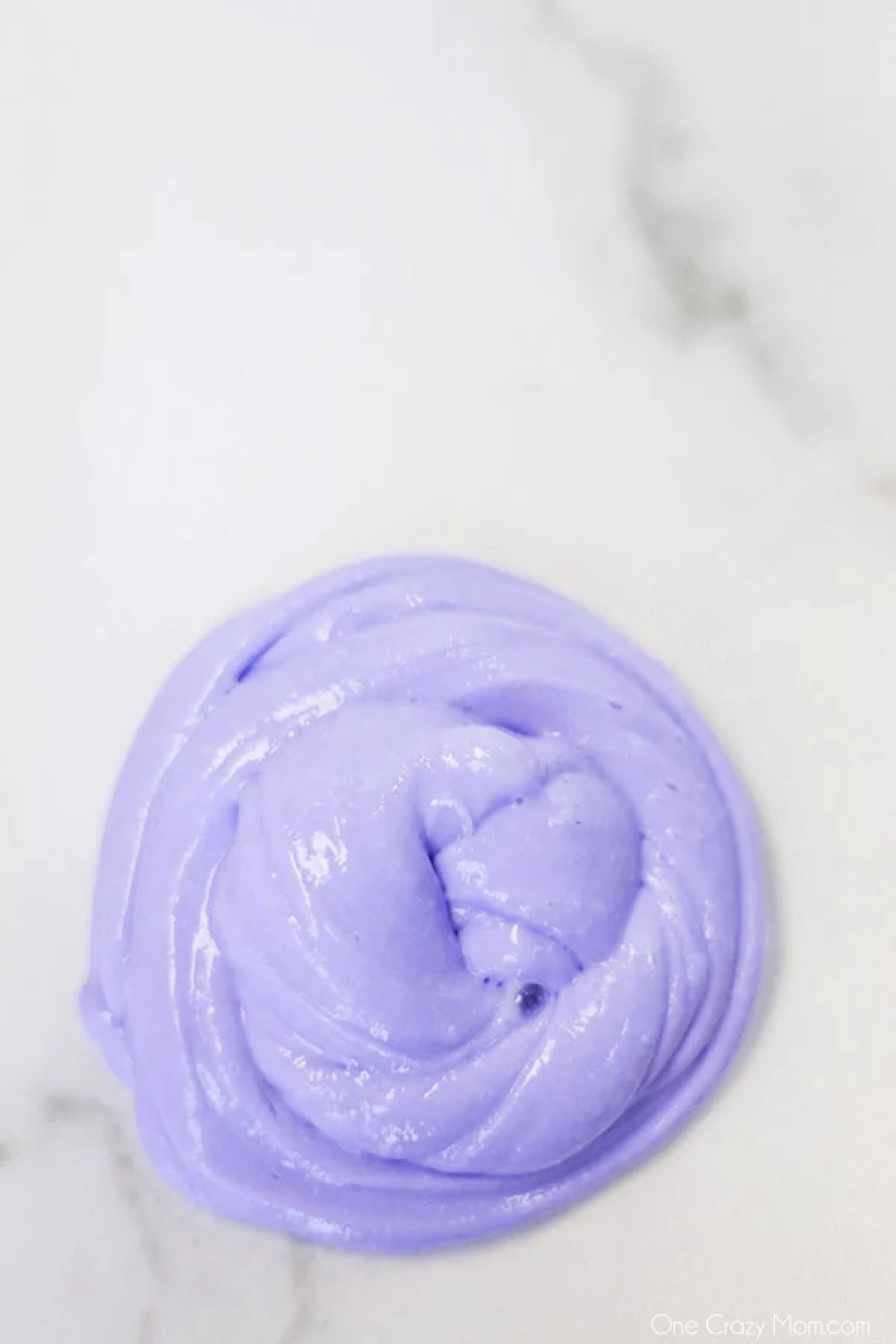 Borax Slime is a very simple DIY and great for beginners just learning to make slime. It only requires a few simple ingredients and is so easy and fun! Borax slime ready to play with.