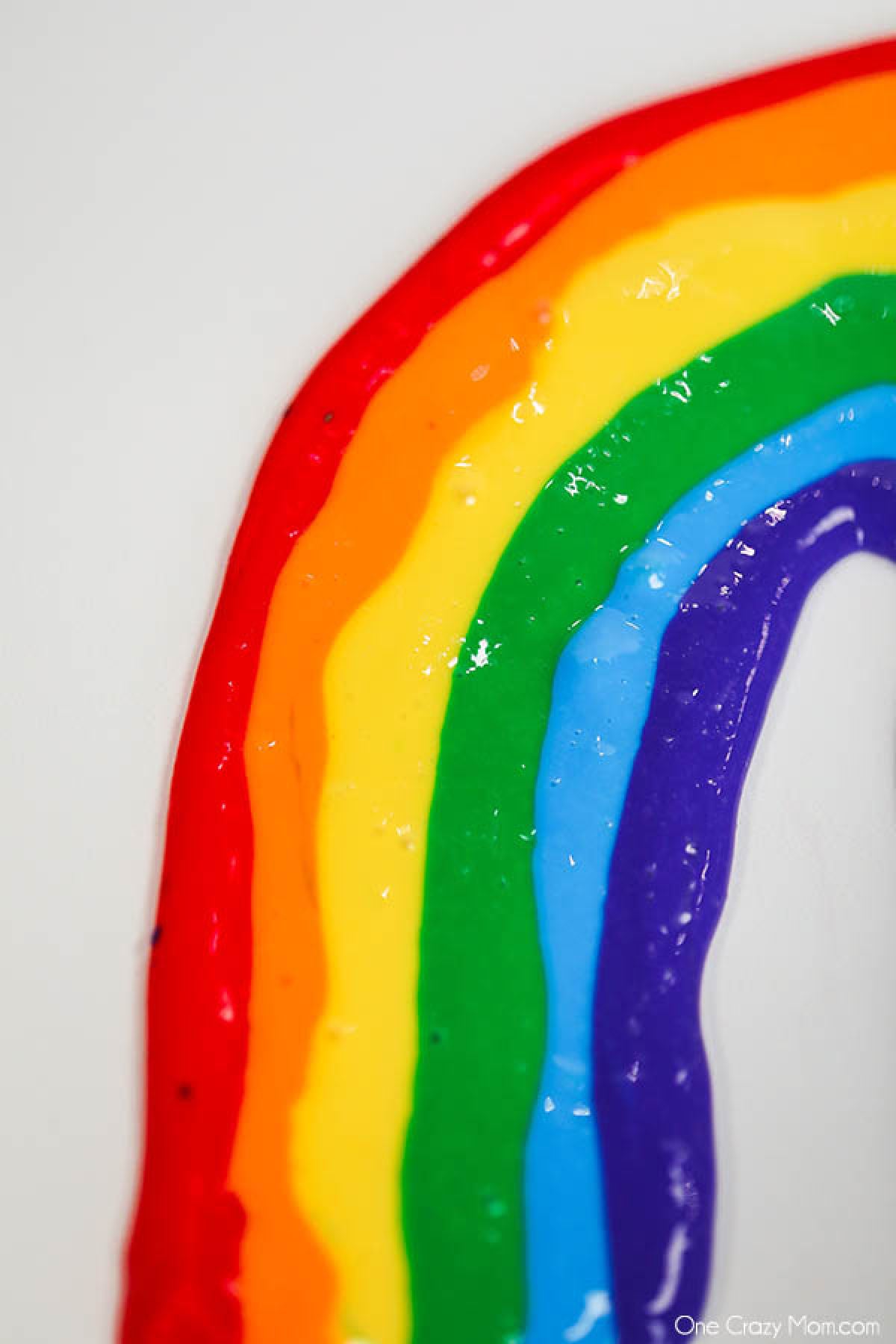 Brighten someone's day and make this colorful and pretty rainbow slime. The kids will have a blast making this and the colors are so fun and vibrant. Rainbow Slime