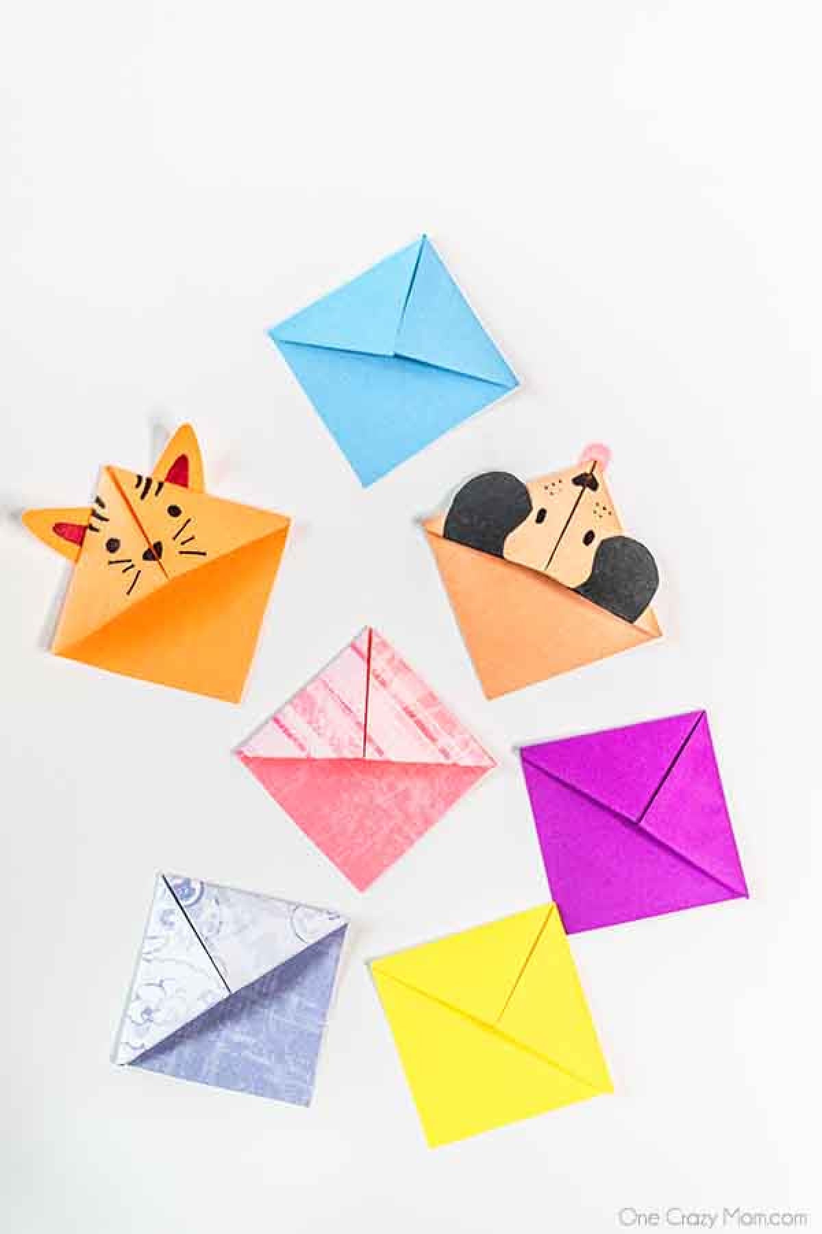 Give this origami bookmark a try for a fun activity for the kiddos. You only need 2 items to make this bookmark making it frugal, easy and fun! Origami bookmarks decorated in different colors and animals.