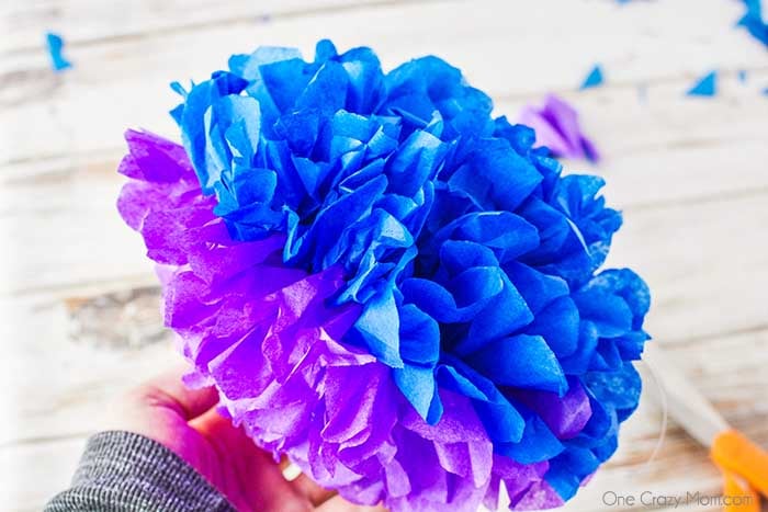 Tissue paper pom poms are so pretty for birthday parties, baby showers and more. Learn how to make these easily with dollar store supplies. Tissue paper pom poms are so pretty for birthday parties, baby showers and more. Learn how to make these easily with dollar store supplies.