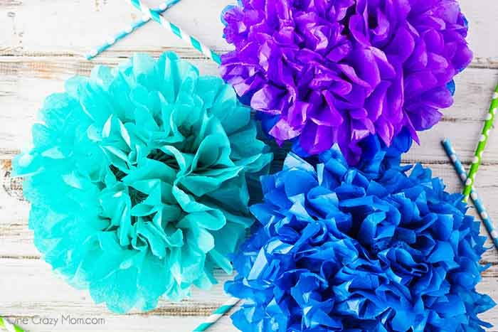Tissue paper pom poms are so pretty for birthday parties, baby showers and more. Learn how to make these easily with dollar store supplies. Tissue paper pom poms are so pretty for birthday parties, baby showers and more. Learn how to make these easily with dollar store supplies.