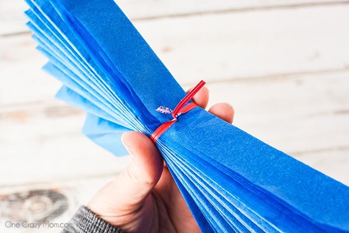 Tissue paper pom poms are so pretty for birthday parties, baby showers and more. Learn how to make these easily with dollar store supplies. Tissue paper pom poms are so pretty for birthday parties, baby showers and more. Learn how to make these easily with dollar store supplies.
