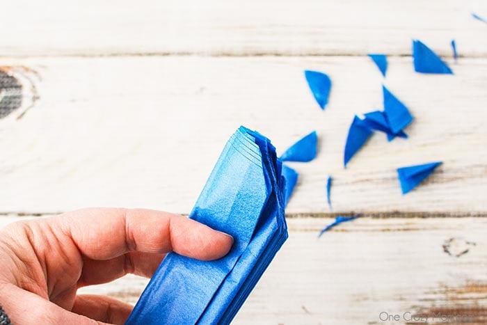 Tissue paper pom poms are so pretty for birthday parties, baby showers and more. Learn how to make these easily with dollar store supplies. Tissue paper pom poms are so pretty for birthday parties, baby showers and more. Learn how to make these easily with dollar store supplies.