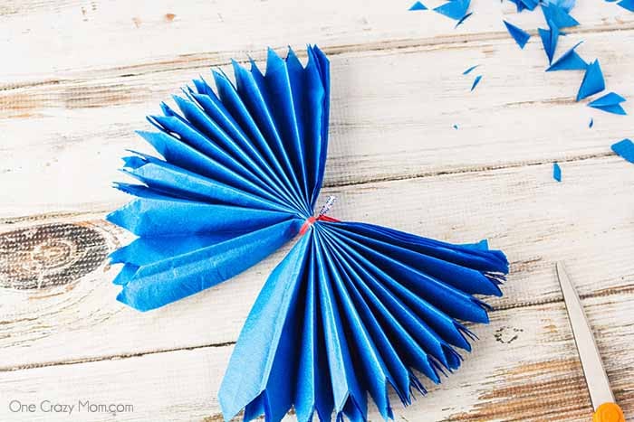 Tissue paper pom poms are so pretty for birthday parties, baby showers and more. Learn how to make these easily with dollar store supplies. Tissue paper pom poms are so pretty for birthday parties, baby showers and more. Learn how to make these easily with dollar store supplies.