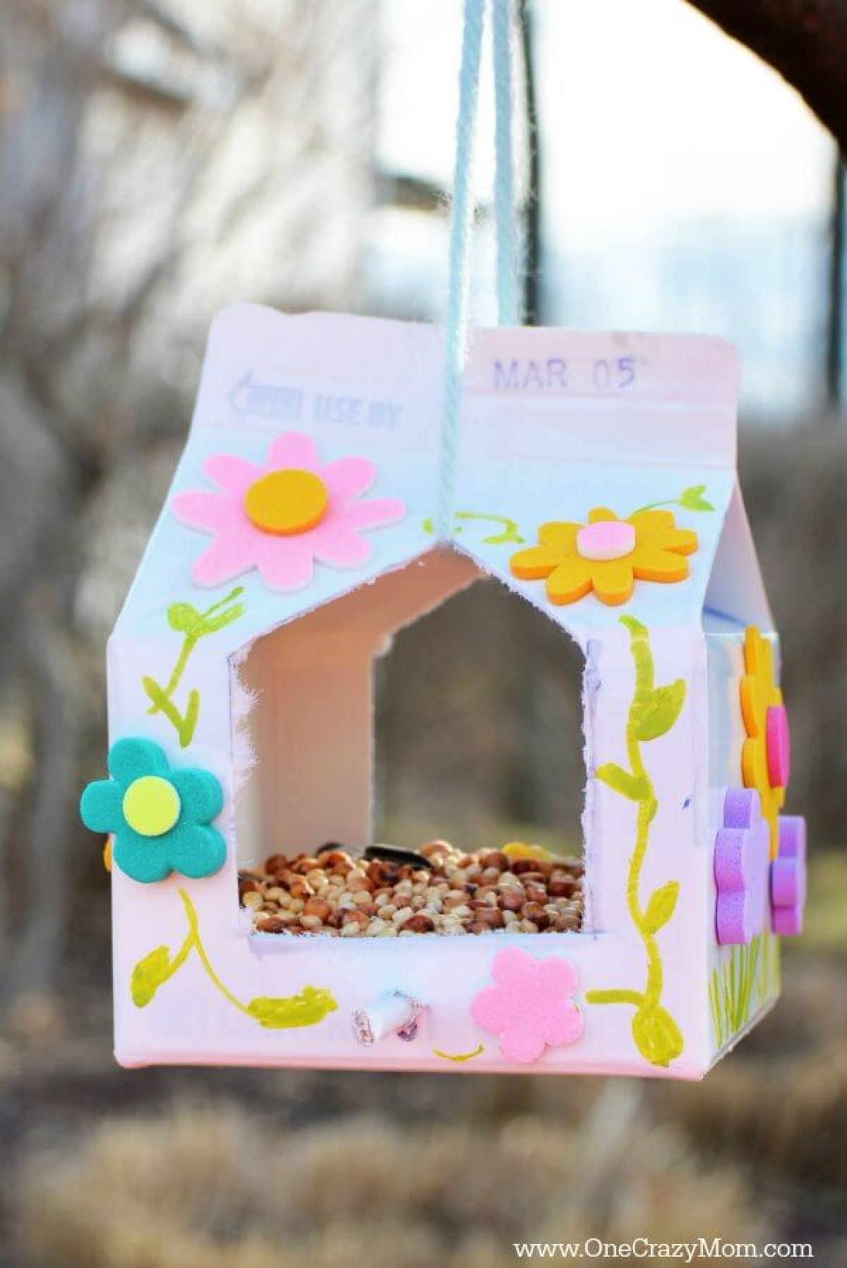 This Homemade Bird Feeder is so fun to make and it uses milk cartons. Kids will love making a milk carton bird feeder. Give this easy DIY Bird feeder a try. This Homemade Bird Feeder is so fun to make and it uses milk cartons. Kids will love making a milk carton bird feeder. Give this easy DIY Bird feeder a try.