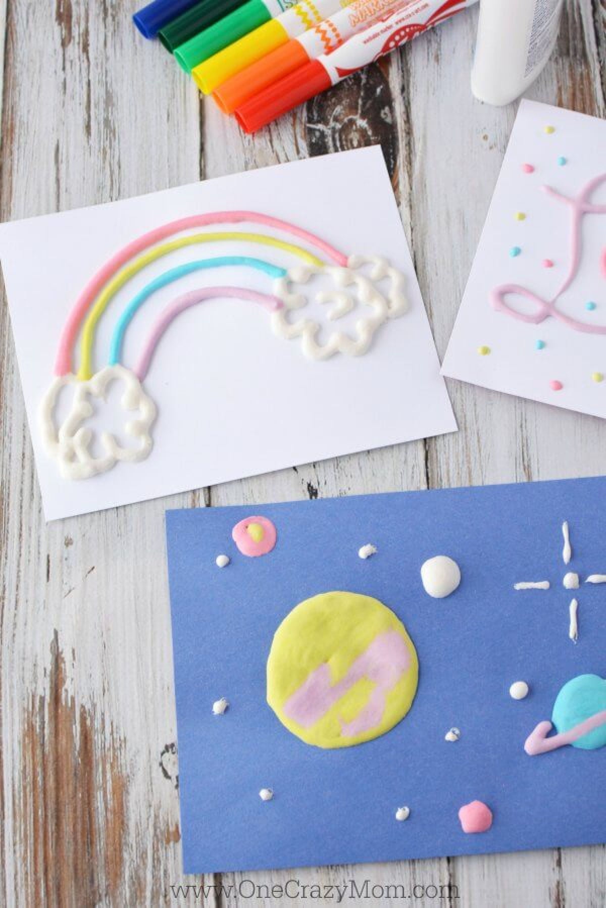 We are going to show you how to make puffy paint and it is super easy! If you need a fun activity at home, try this easy DIY sure to be a blast and entertain the kiddos. Pictures of puff paint designs on paper.