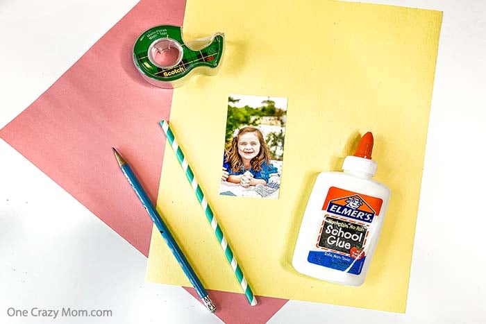 Handprint Flowers are perfect to make for Mother's Day, birthdays and more. This gift will be cherished for years to come by Mom, Grandma and others. Supplies for handprint - paper, glue, tape, straw, picture, scissors.
