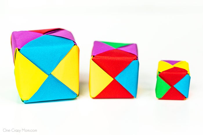 Grab some paper and learn how to make this easy origami cube. This is a simple but fun activity perfect to keep the kids busy while having a blast. Step by step instructions for making an origami cube.