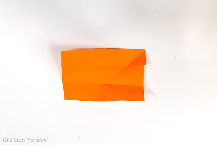 Grab some paper and learn how to make this easy origami cube. This is a simple but fun activity perfect to keep the kids busy while having a blast. Step by step instructions for making an origami cube.