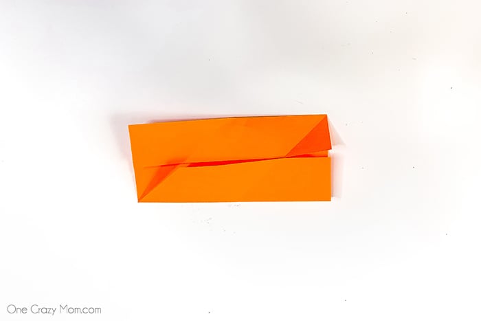 Grab some paper and learn how to make this easy origami cube. This is a simple but fun activity perfect to keep the kids busy while having a blast. Step by step instructions for making an origami cube.