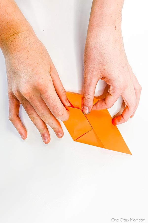 Grab some paper and learn how to make this easy origami cube. This is a simple but fun activity perfect to keep the kids busy while having a blast. Step by step instructions for making an origami cube.