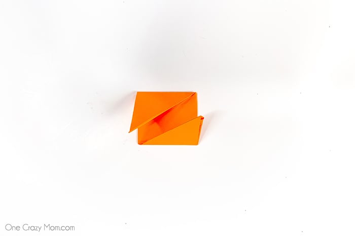 Grab some paper and learn how to make this easy origami cube. This is a simple but fun activity perfect to keep the kids busy while having a blast. Step by step instructions for making an origami cube.