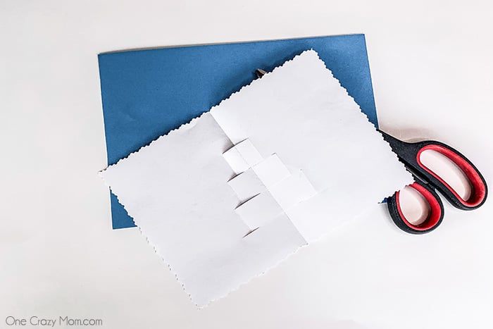 Paper unfolded on top of outer paper.