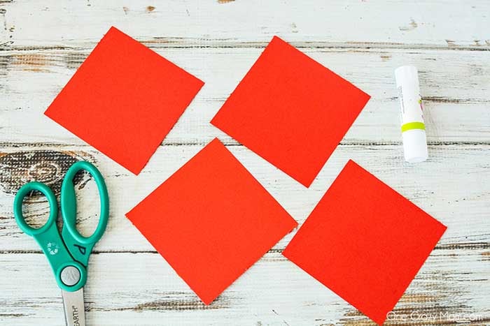 Paper flowers are so fun and perfect for baby showers, decor and much more. Learn how to make paper flowers in just a few easy steps. These are so simple. Supplies for Paper Flowers - cardstock, scissors, glue stick, school glue, pencil, wood skewers.