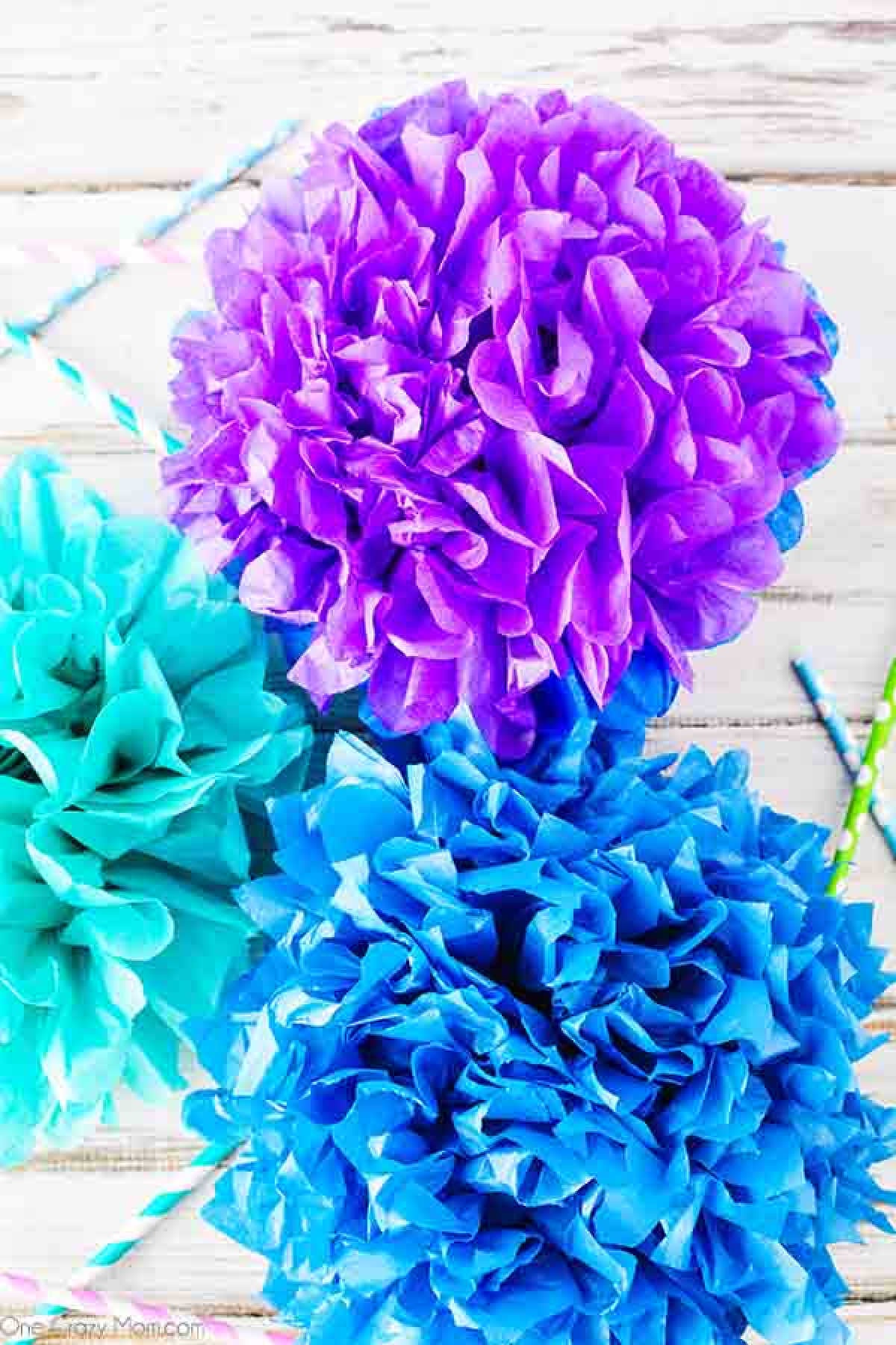 Tissue paper pom poms are so pretty for birthday parties, baby showers and more. Learn how to make these easily with dollar store supplies. Tissue paper pom poms are so pretty for birthday parties, baby showers and more. Learn how to make these easily with dollar store supplies.