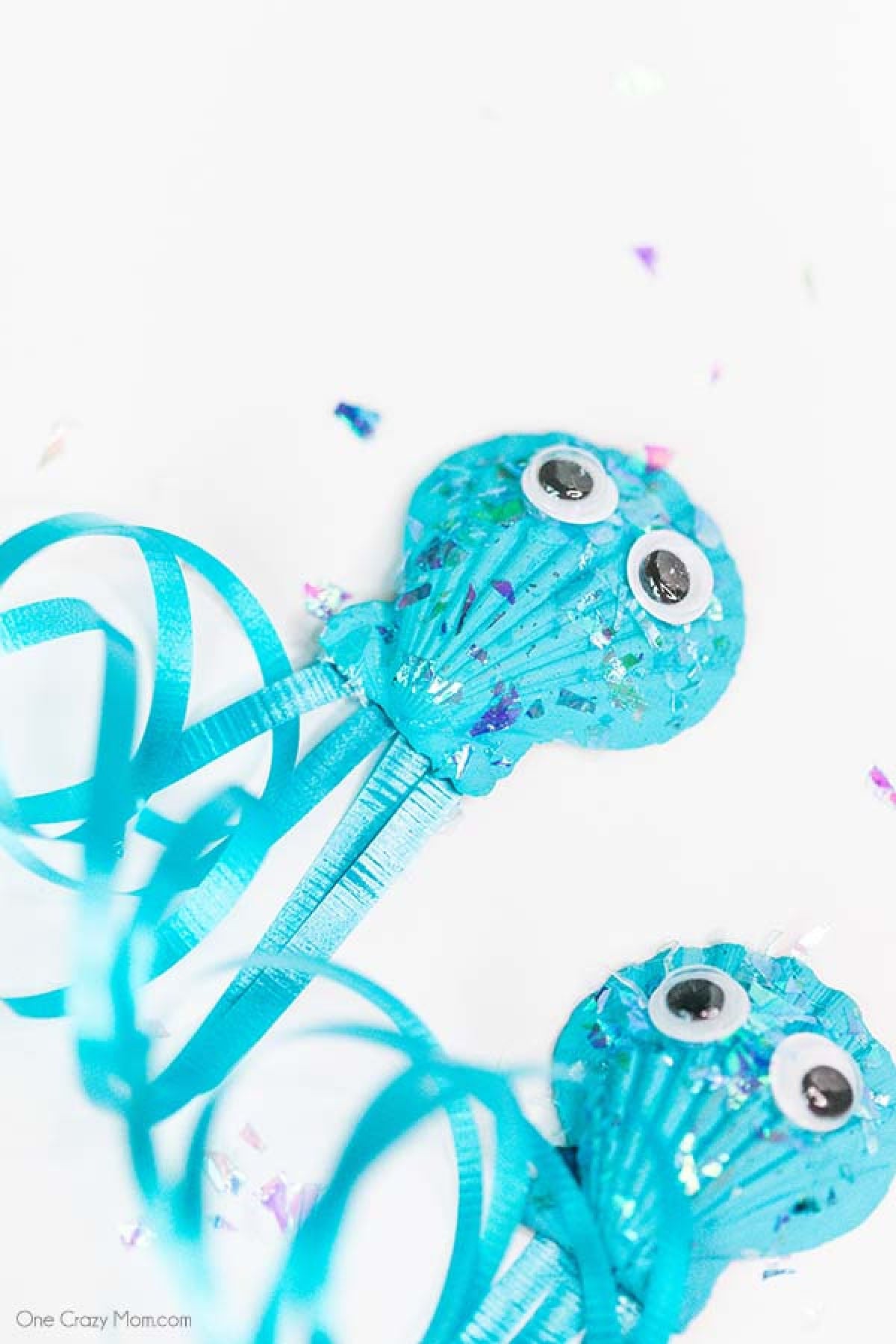 This DIY Jellyfish Seashell Craft is the perfect craft to do during the summer. Keep the kiddos busy with this inexpensive and simple seashell craft. This DIY Jellyfish Seashell Craft is the perfect craft to do during the summer. Keep the kiddos busy with this inexpensive and simple seashell craft.