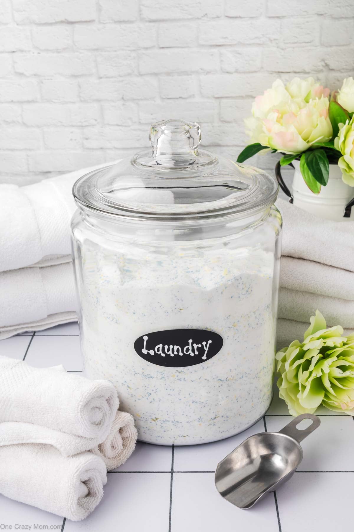 Glass container with laundry detergent.