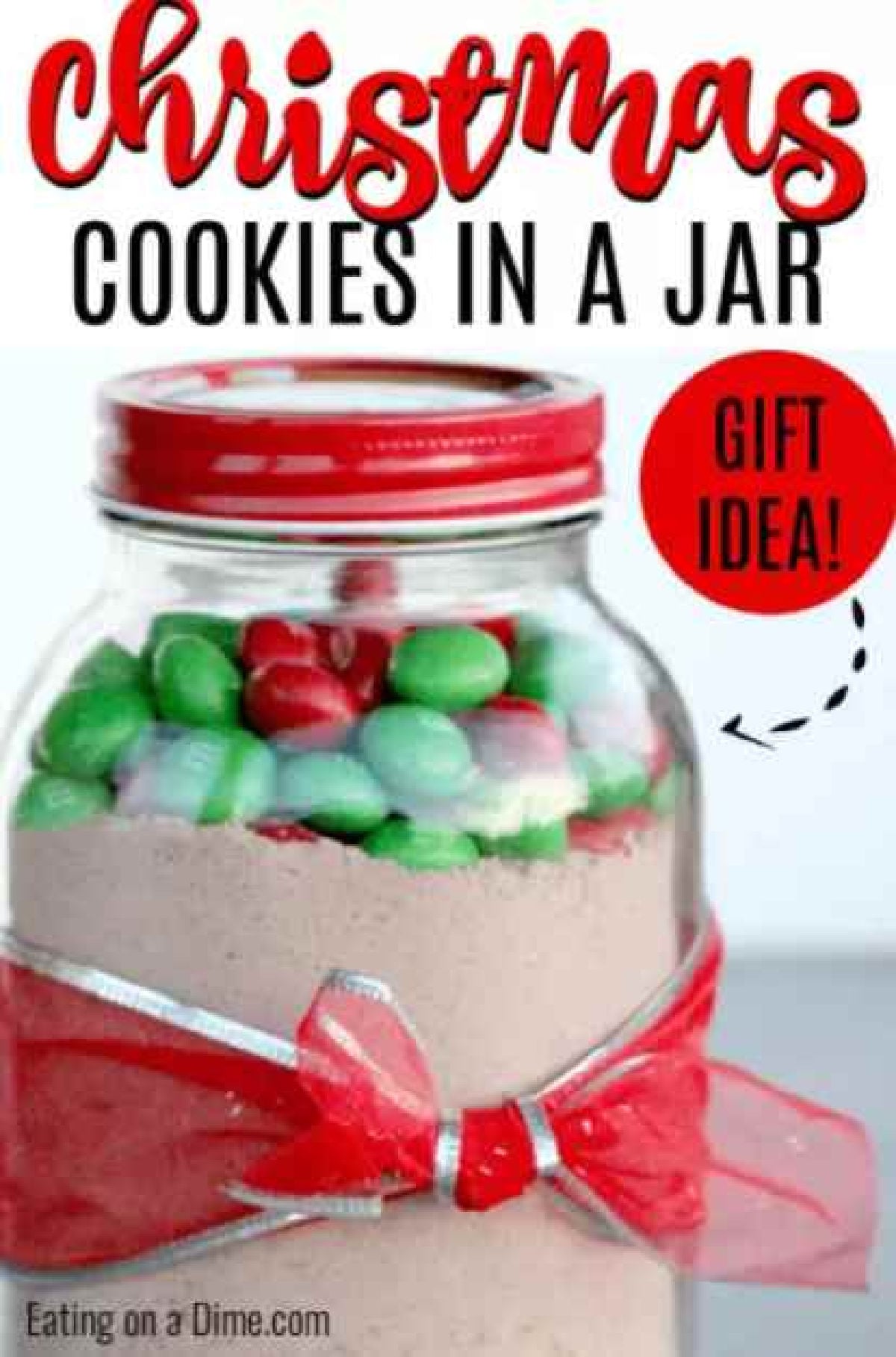 Mason jar with Christmas cookies mix in it.