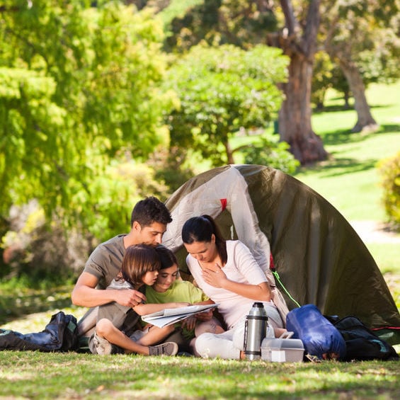 Family in front of tent.