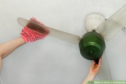 Car wash mitt cleaning the fan.