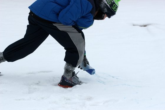 Looking for winter activities for kids? Learn How to make Snow Paint - Snow painting is fun. This is our favorite winter activities for toddlers. Painting in the snow.