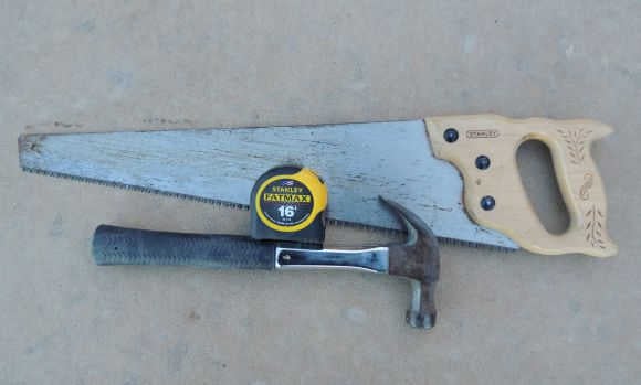 Saw, tape measure and hammer.