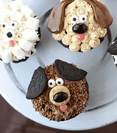 Puppy cupcakes on a platter.