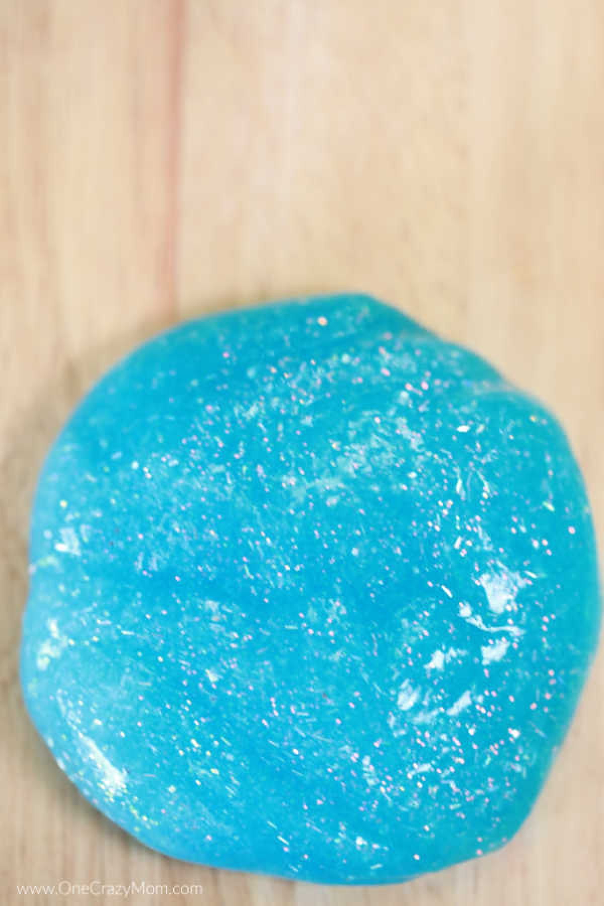 We have a super simple DIY for 2 Ingredient Slime that your kids can make. You can make really cool slime with ONLY 2 ingredients that your kids will love! Pile of slime.