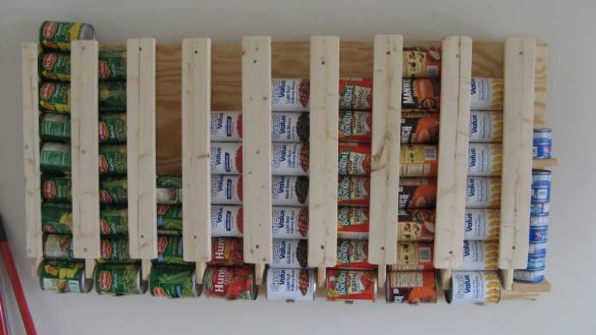 Learn how to organize canned food with these easy canned food storage ideas. Over 15 canned food storage hacks that will get your pantry in order.
