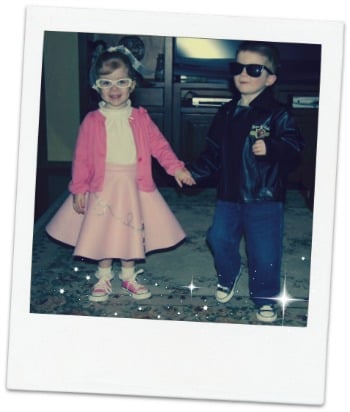 50's costume on boy and girl.