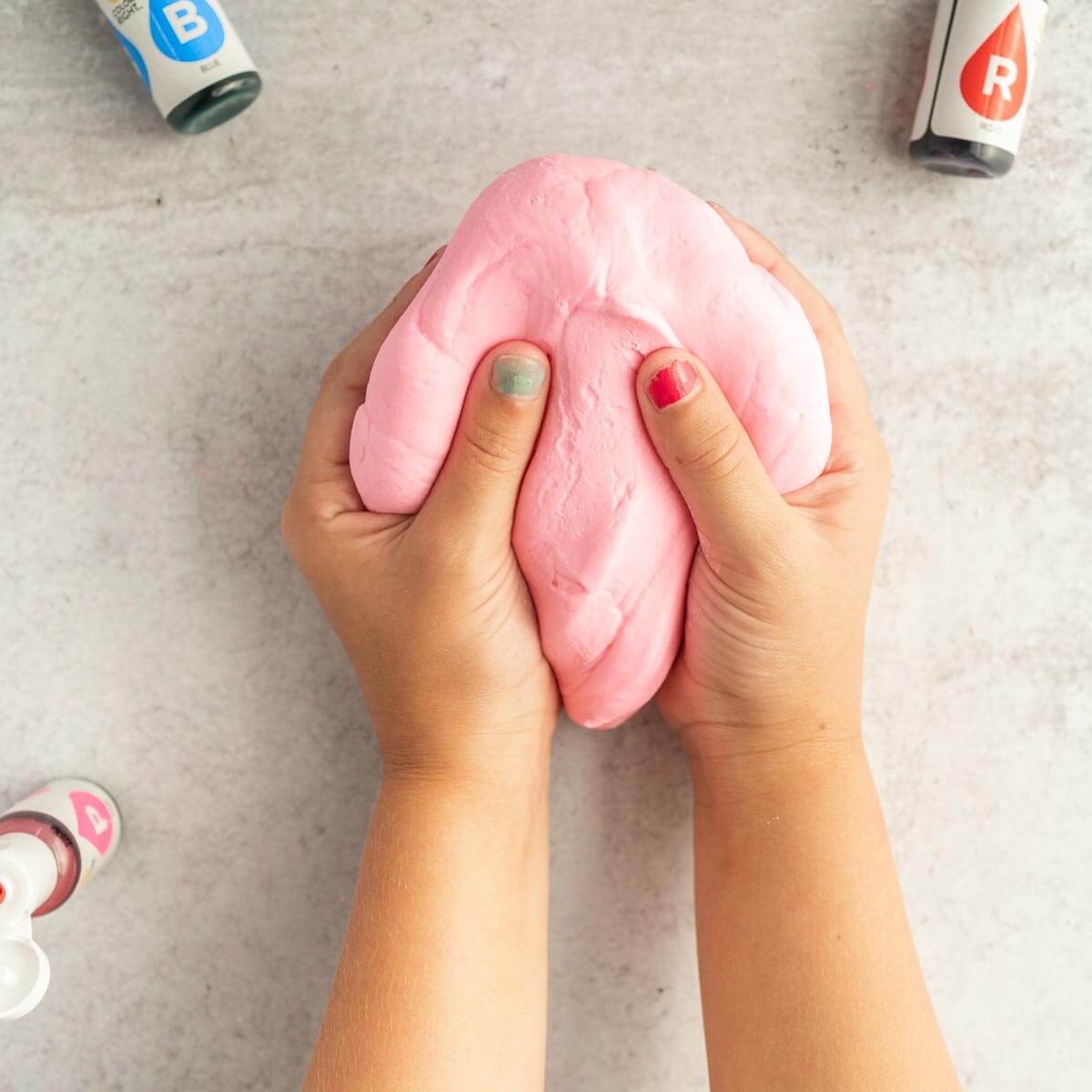 Slime in hands.