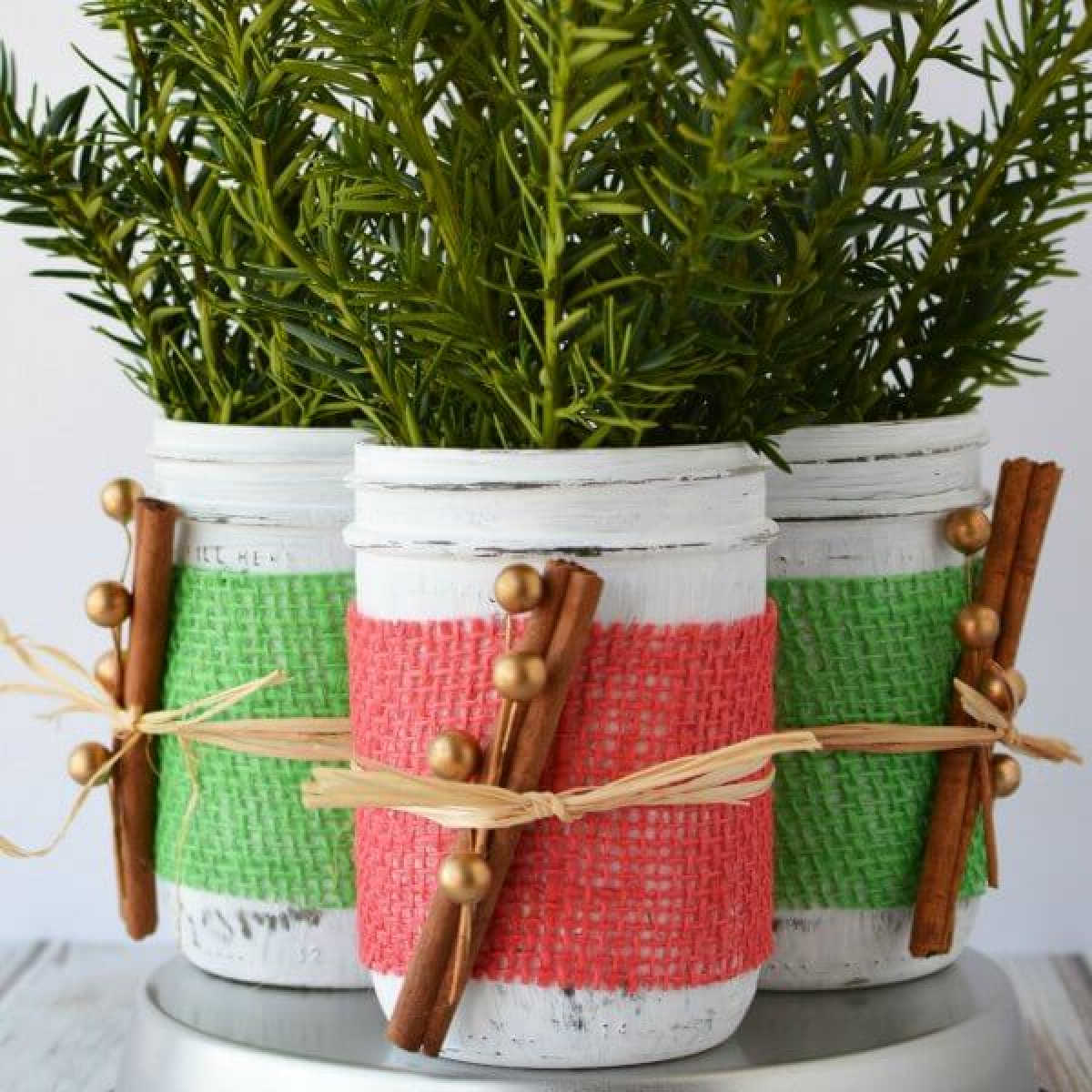 If you're looking for holiday centerpiece ideas,make this rustic Christmas centerpiece.This mason jar Christmas centerpiece is so simple and easy!