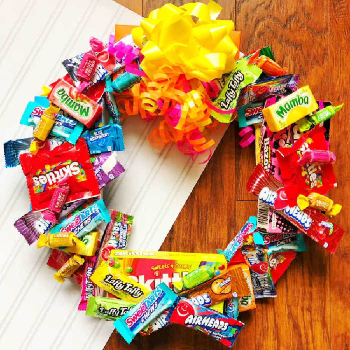 Learn how to make a candy wreath that everyone will love. This easy candy wreath is so fun and a great gift for any occasion. Try this fun and frugal idea. Learn how to make a candy wreath that everyone will love. This easy candy wreath is so fun and a great gift for any occasion. Try this fun and frugal idea.