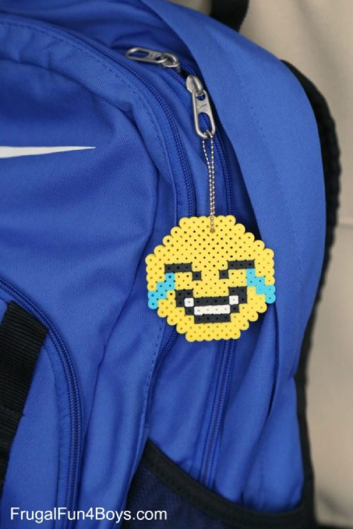 Perler bead crafts are so much fun and we have over 15 easy perler bead ideas. Choose from picture frames, magnets and so much more. Emjoi keychain on bookbag.