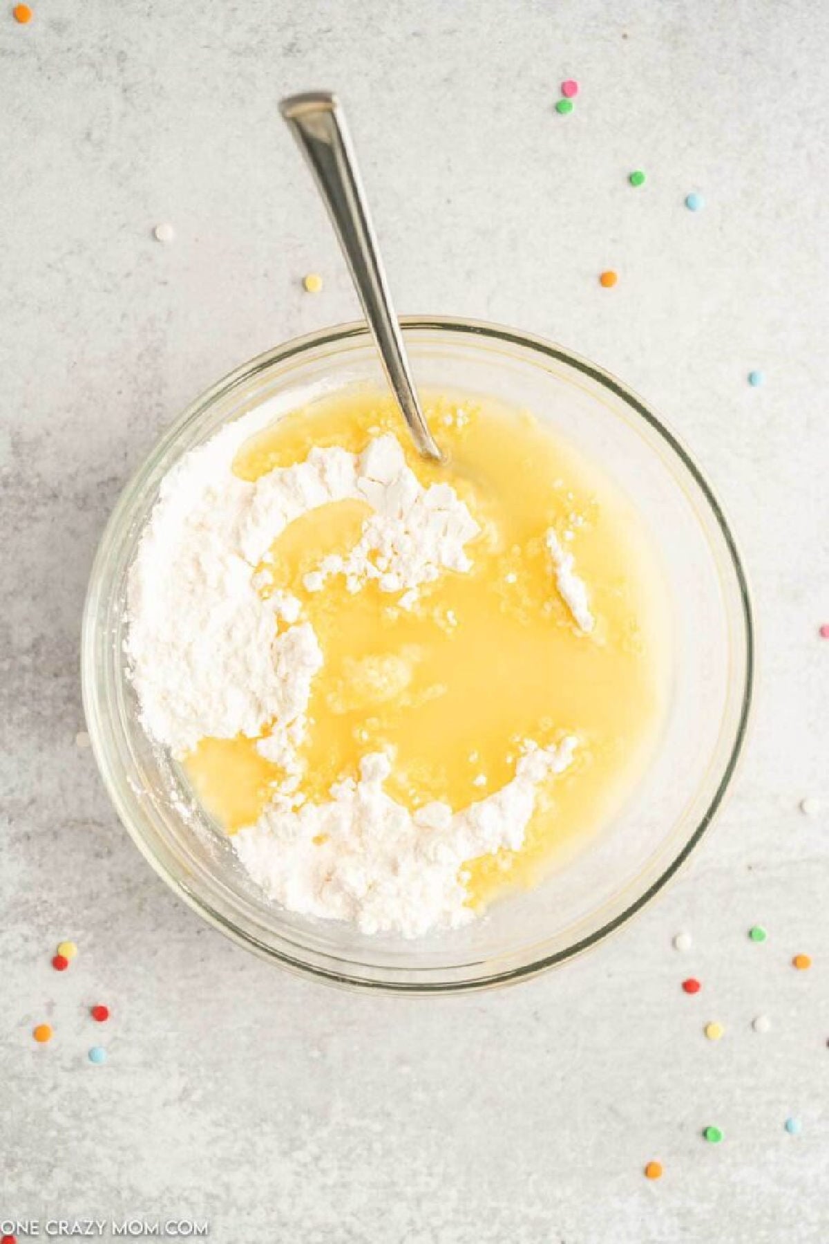 Mixing ingredients together in a bowl.