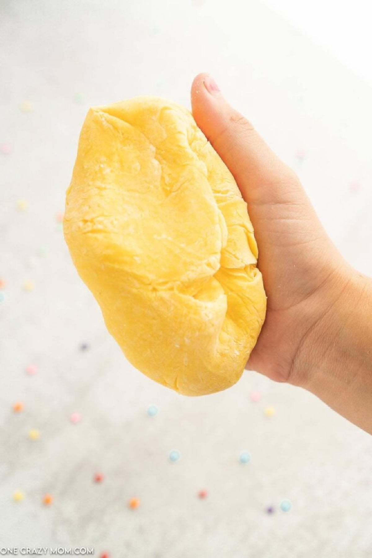 Pudding slime in hands.