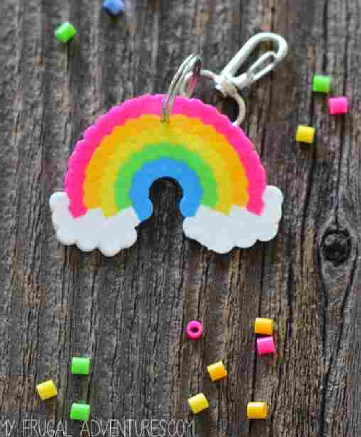 Rainbow key chain surrounded by beans.